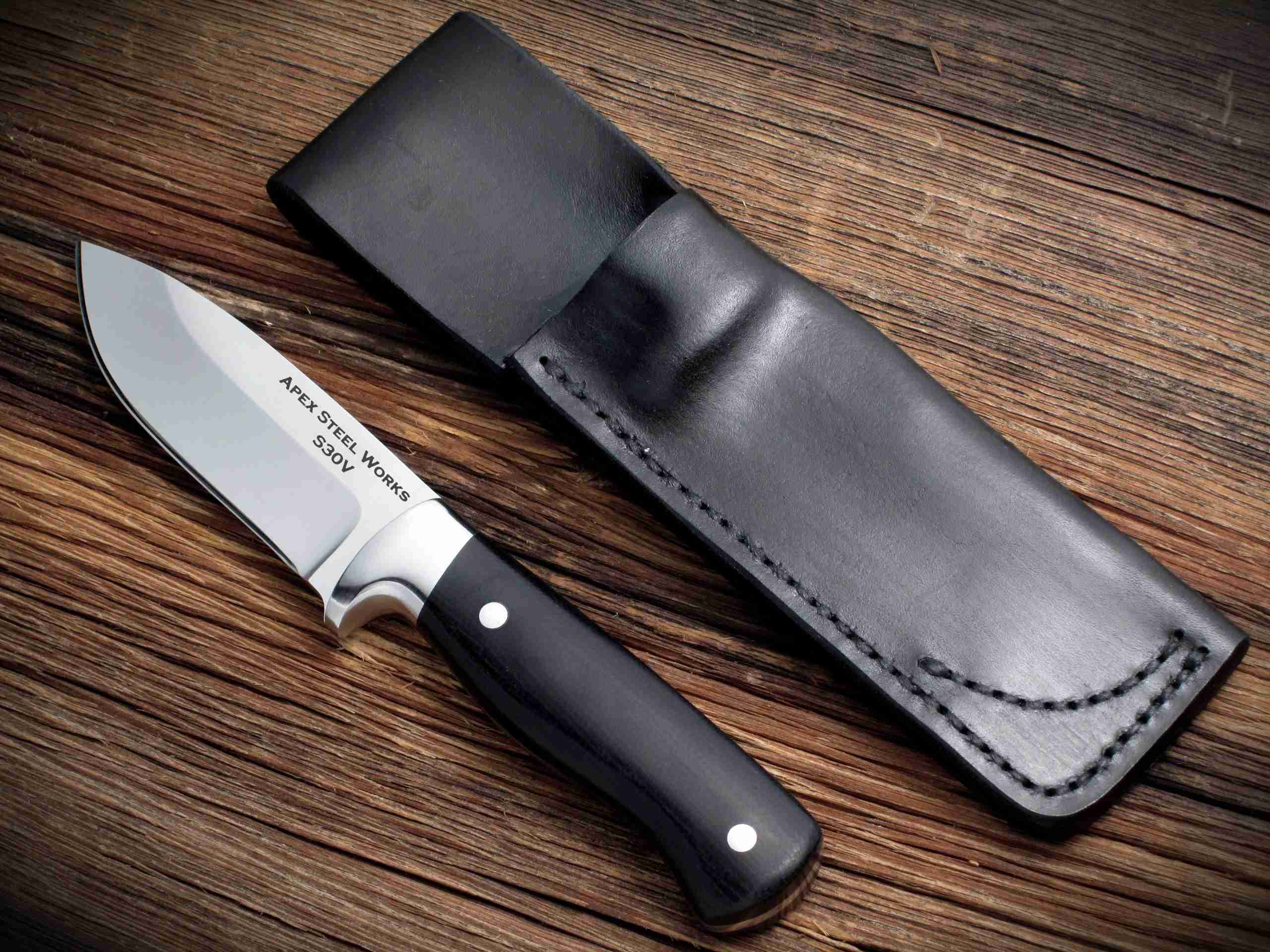 S30V Hunting Knife made by Apex Steel Works with stainless bolsters and CPM S30V blade with black linen micarta handle scales