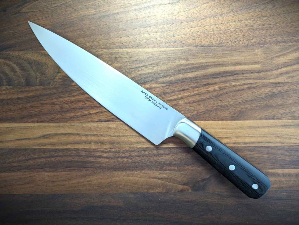 7 inch CPM S35VN chef's knife with black micarta handle and 304 stainless bolsters