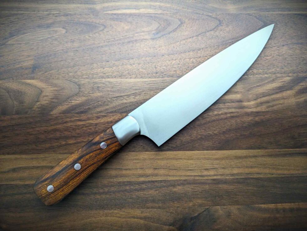 Apex Steel Works 8 inch S35VN Chef's Knife desert ironwood #002 005 showing back side of S35VN blade and desert ironwood handle